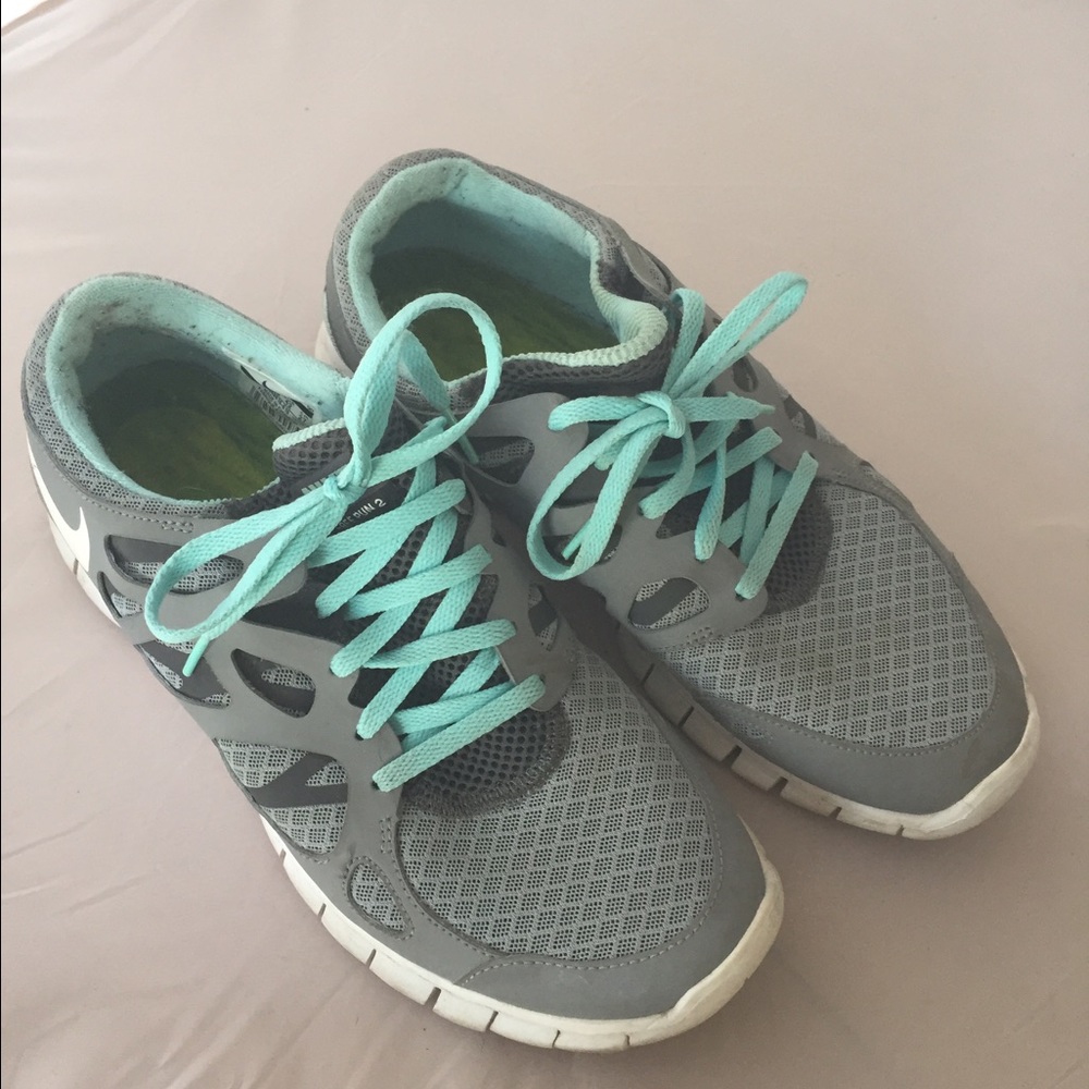 Nike light gray running shoes. Size 10.